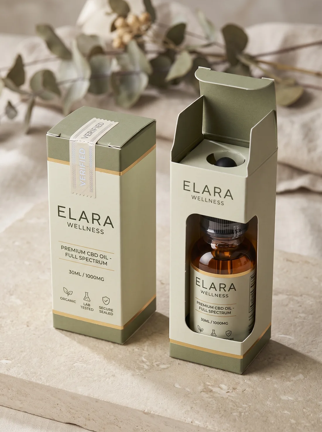 Two CBD oil boxes showing a tamper-evident seal and a shrink band visible through a window